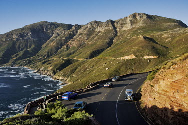 Aerial view of Chapmans Peak Drive, steep cliffs fall into the Atlantic Ocean right next to the scenic drive - Western Cape Province, South Africa Martin Harvey Coast,Road,Winding,Car,Rocky,Cliff,Mountain,Hills,Ocean,Sea,Viewpoint